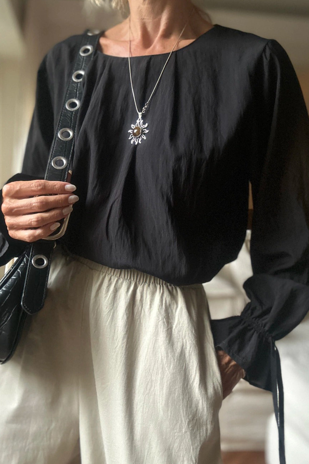 Black Pleated Round Neck Flounce Long Sleeve Blouse