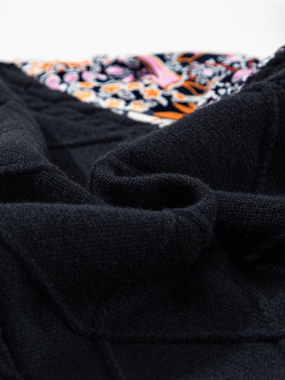 Graceful Black Floral Peplum Sweater with Ruffled Hem