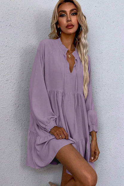 Lavendula Tie Split Neck Smocked Detail Long Puff Sleeve Ruffle Hem Loose Dress