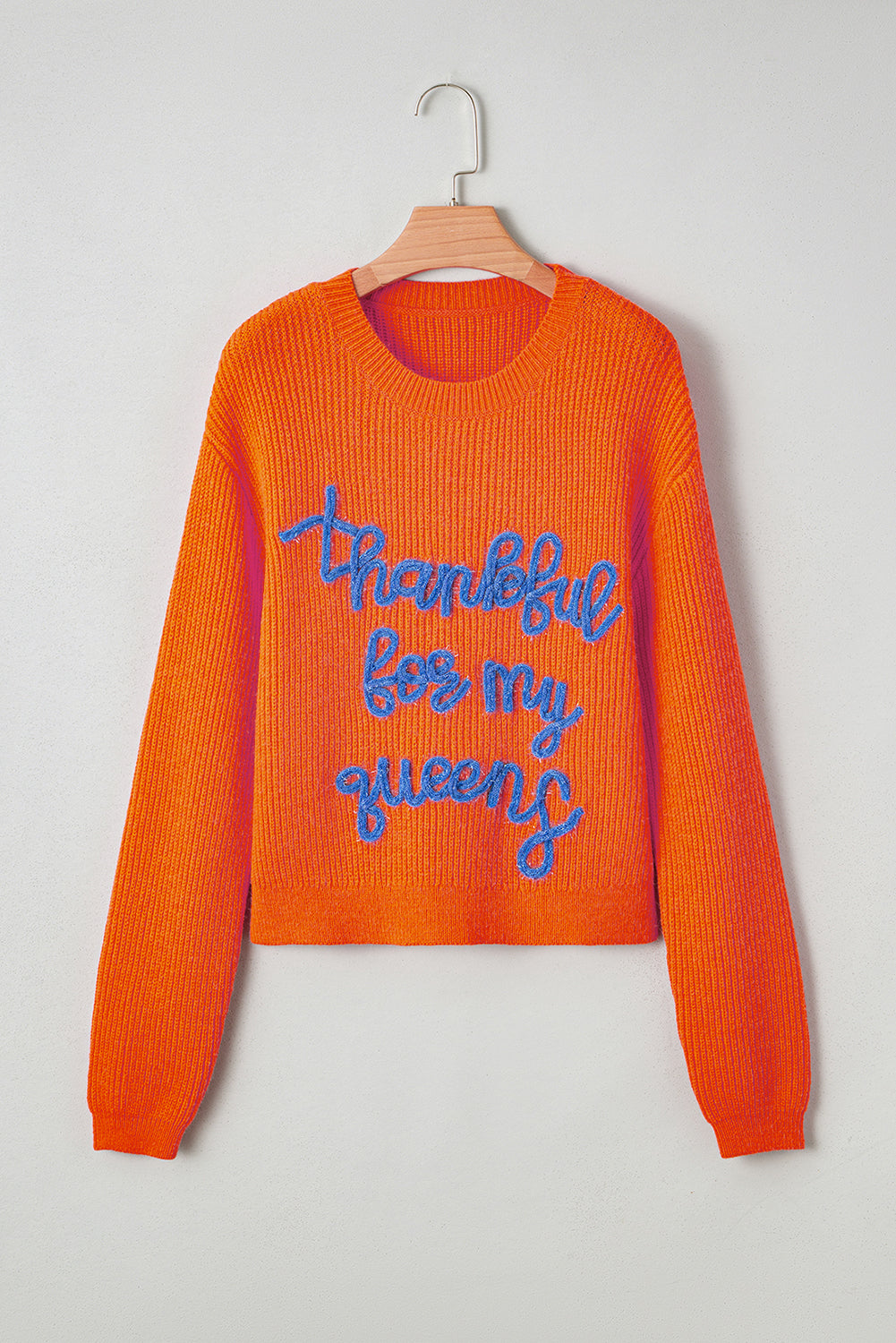 orange graphic sweater