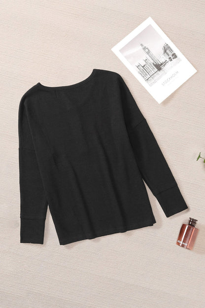 Elegant Black Waffle Knit Henley Top with Button Front