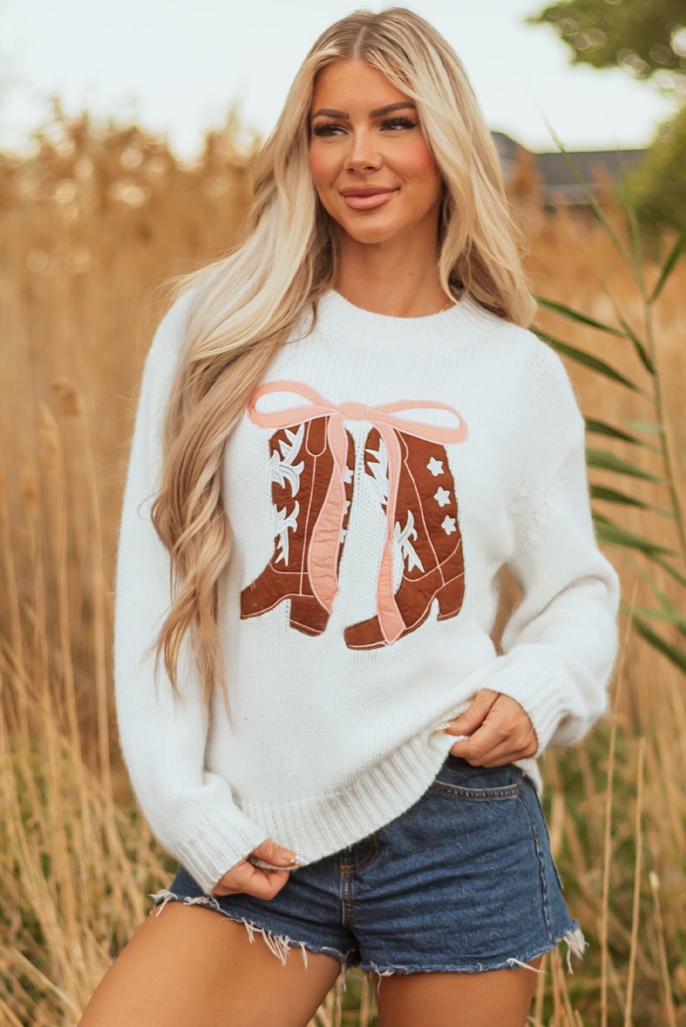 white embroidered sweater