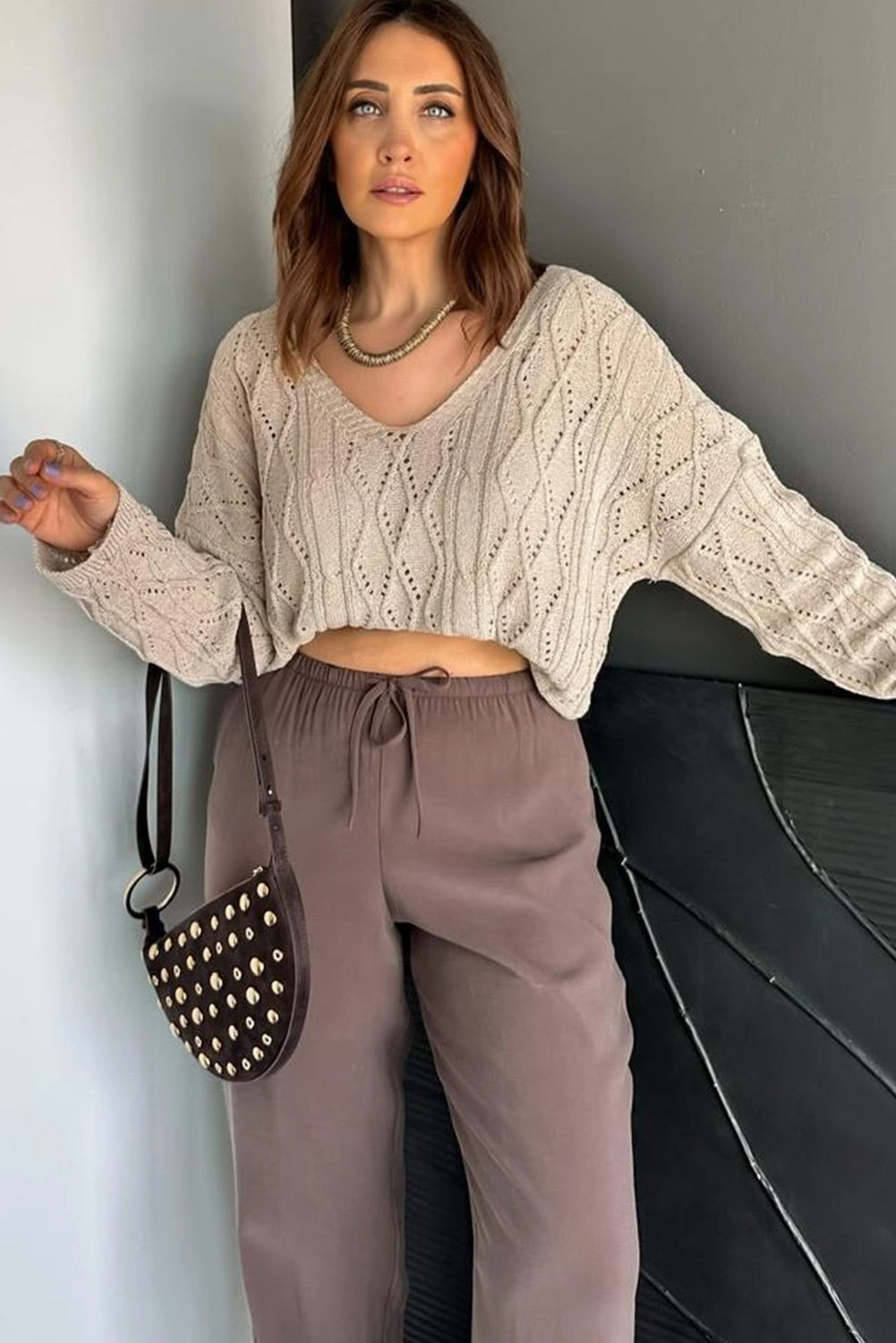 Parchment Geometric Textured Crisscross Lace up Knit V Neck Sweater