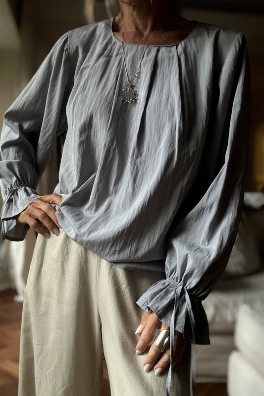 High-rise Pleated Round Neck Flounce Long Sleeve Blouse