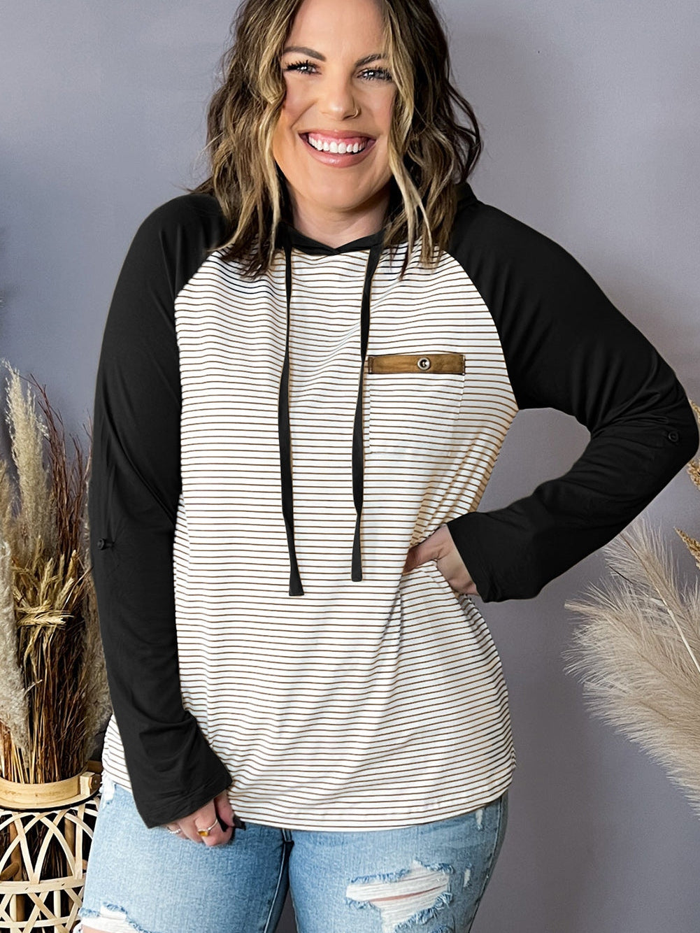 Cozy Black Striped Raglan Hoodie with Buttoned Pocket for Curvy Fashionistas