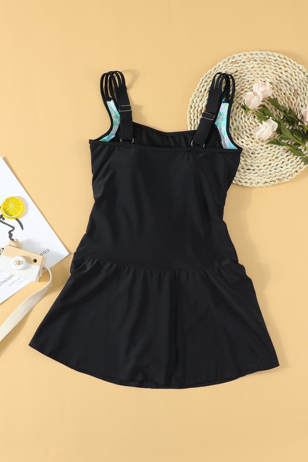 Floral Print Black Swimdress with Adjustable Straps and Ruched Panel