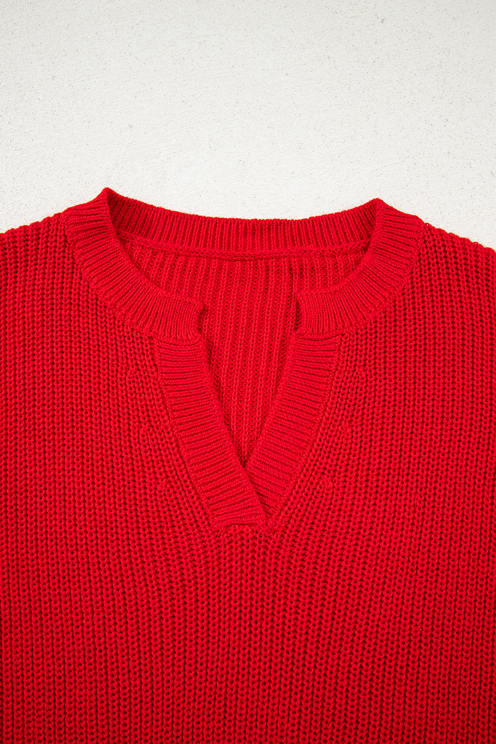 red v neck sweater