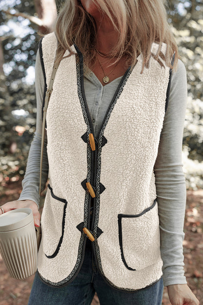 white sherpa vest