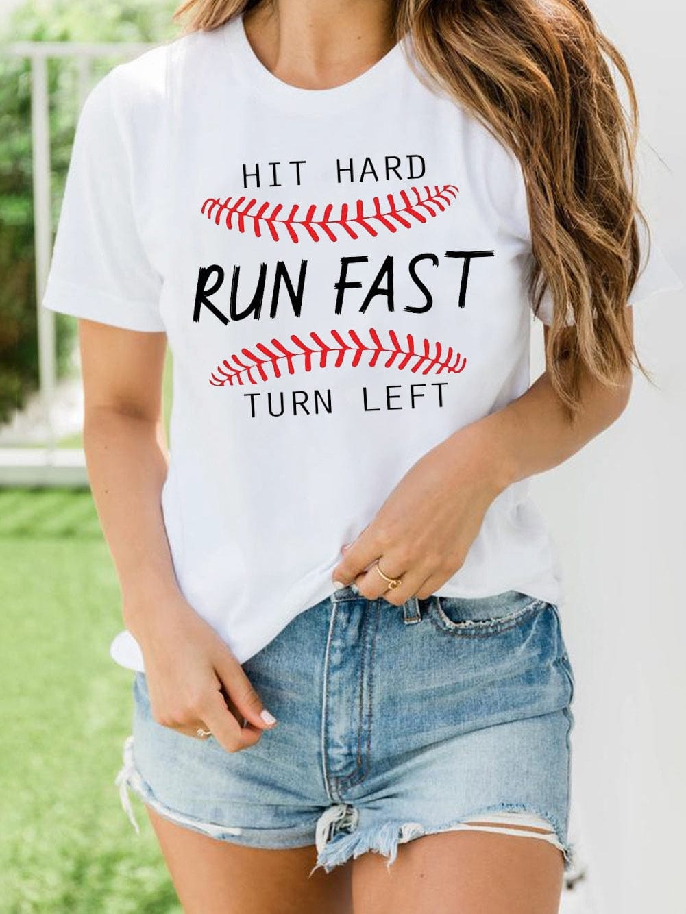 Baseball Print White Tee with "Hit Hard Run Fast Turn Left" Design