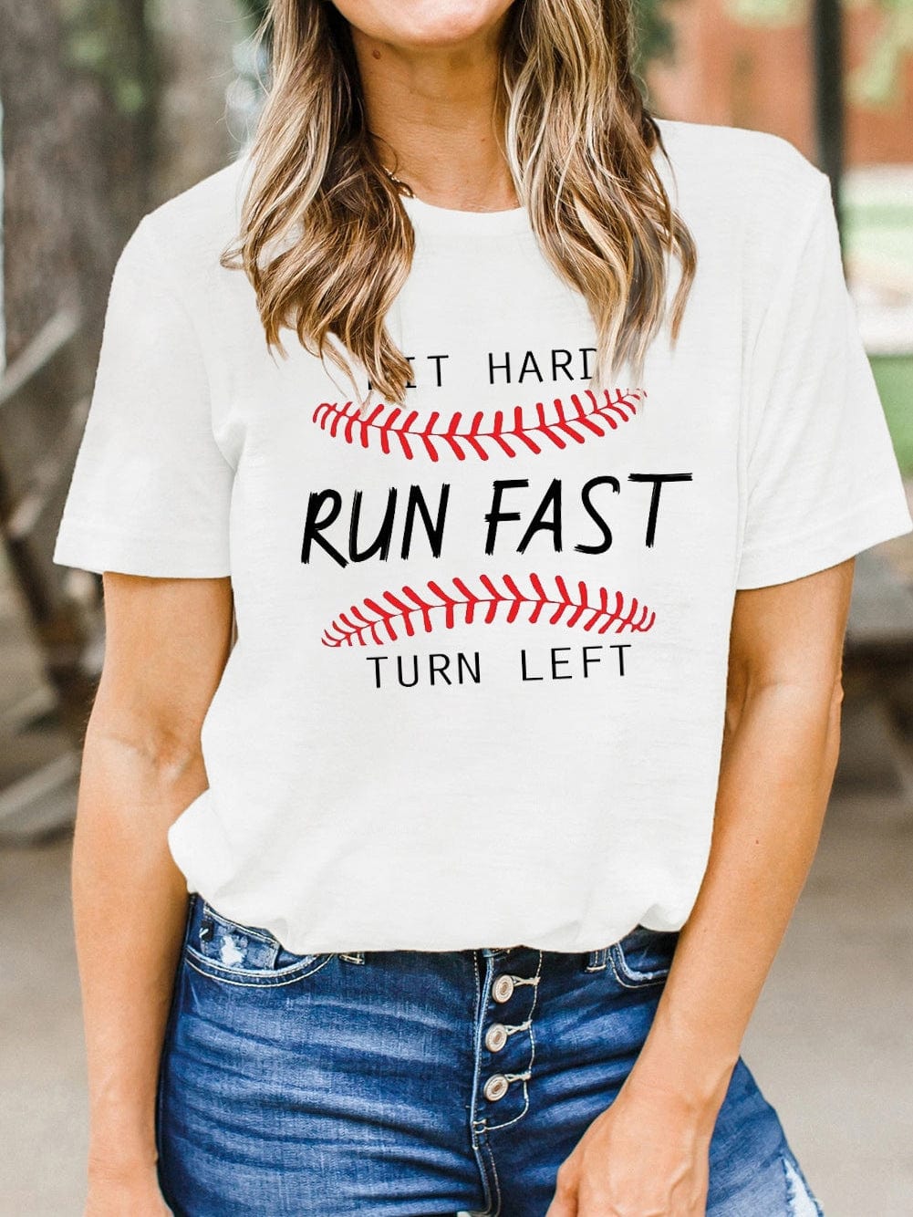 Baseball Print White Tee with "Hit Hard Run Fast Turn Left" Design