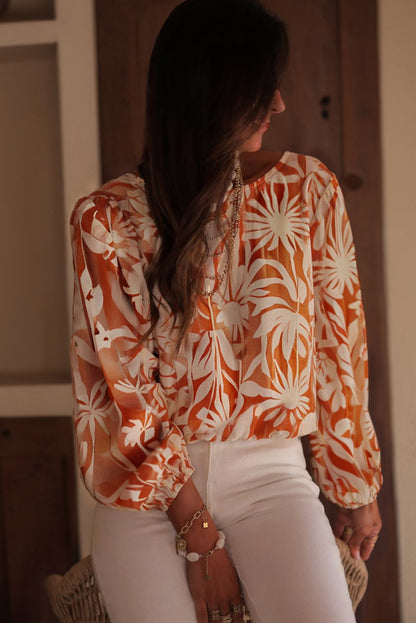 orange floral blouse