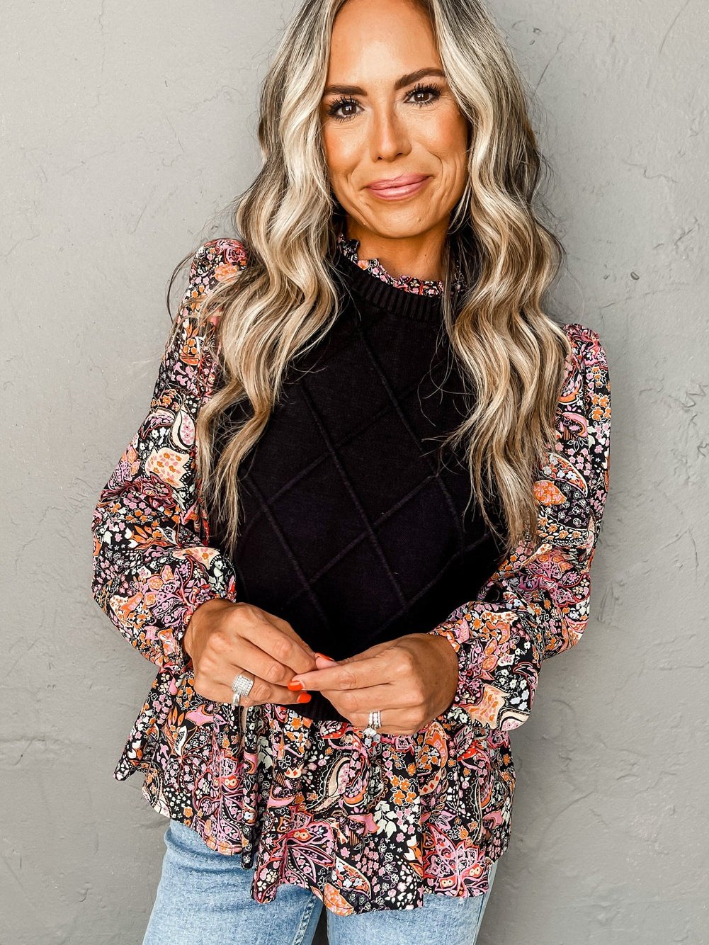 Graceful Black Floral Peplum Sweater with Ruffled Hem