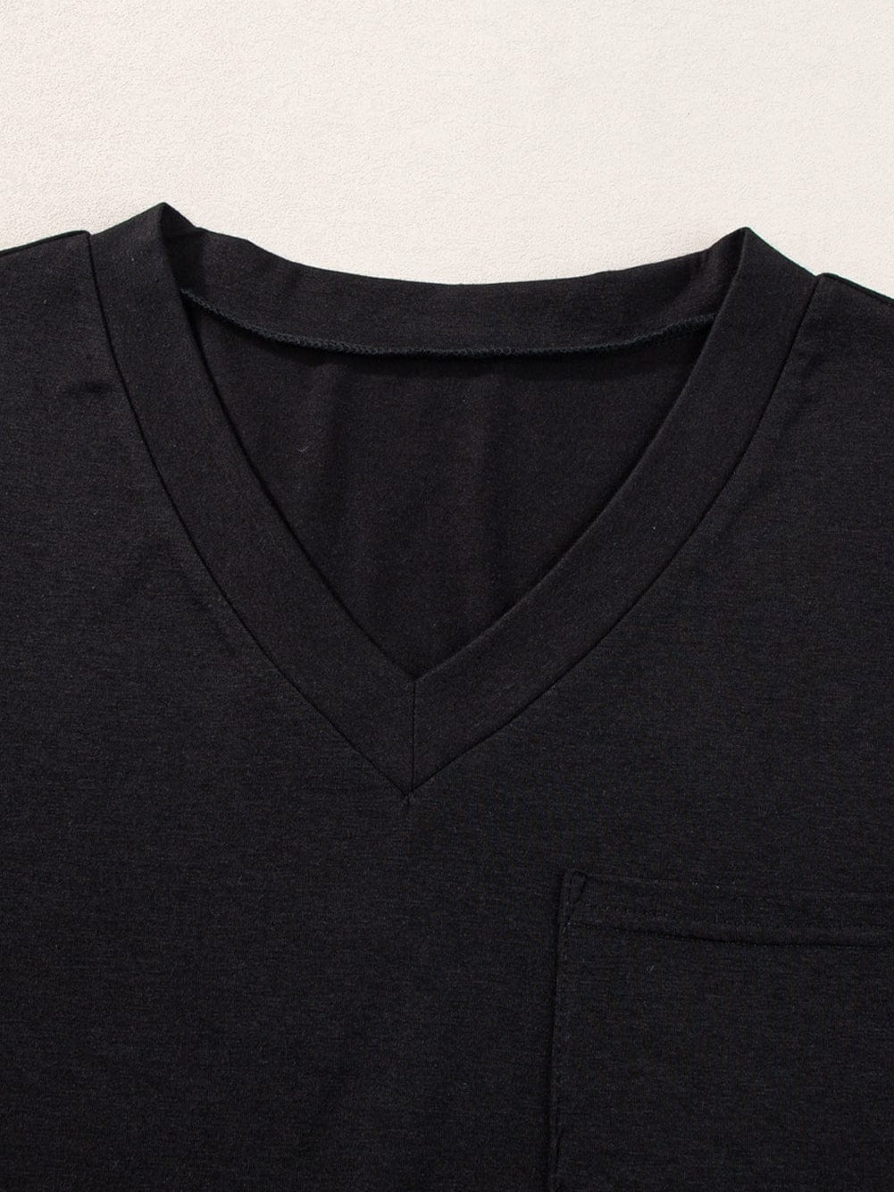 Black V Neck Pocketed Tee with Curved Hem