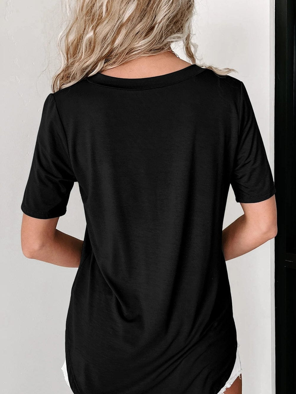 Black V Neck Pocketed Tee with Curved Hem