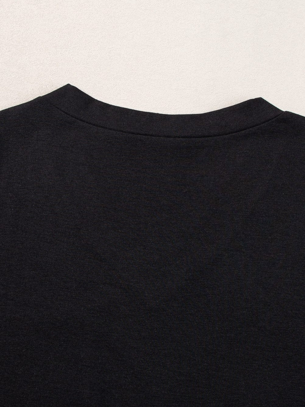 Black V Neck Pocketed Tee with Curved Hem