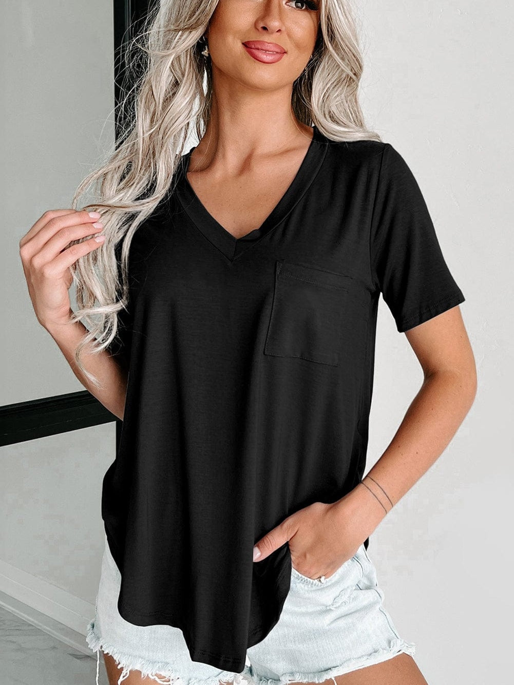 Black V Neck Pocketed Tee with Curved Hem
