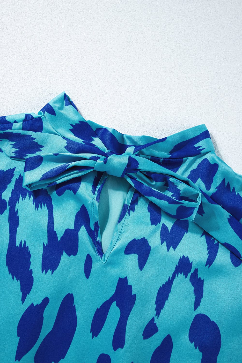 Blue Leopard Mock Neck Satin Blouse