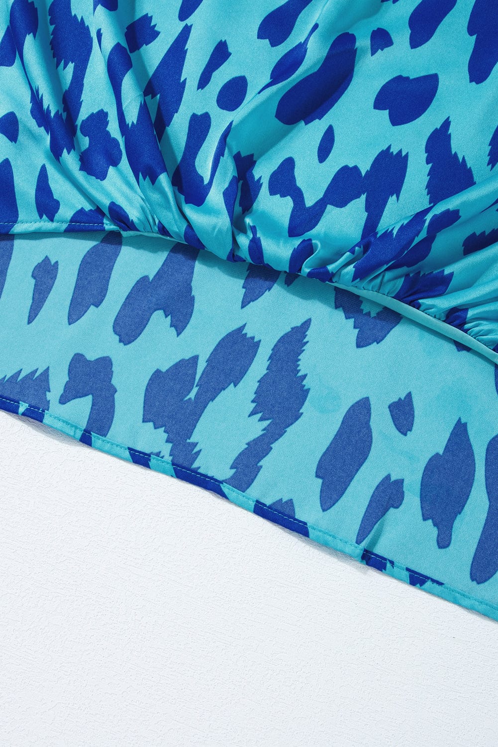 Blue Leopard Mock Neck Satin Blouse