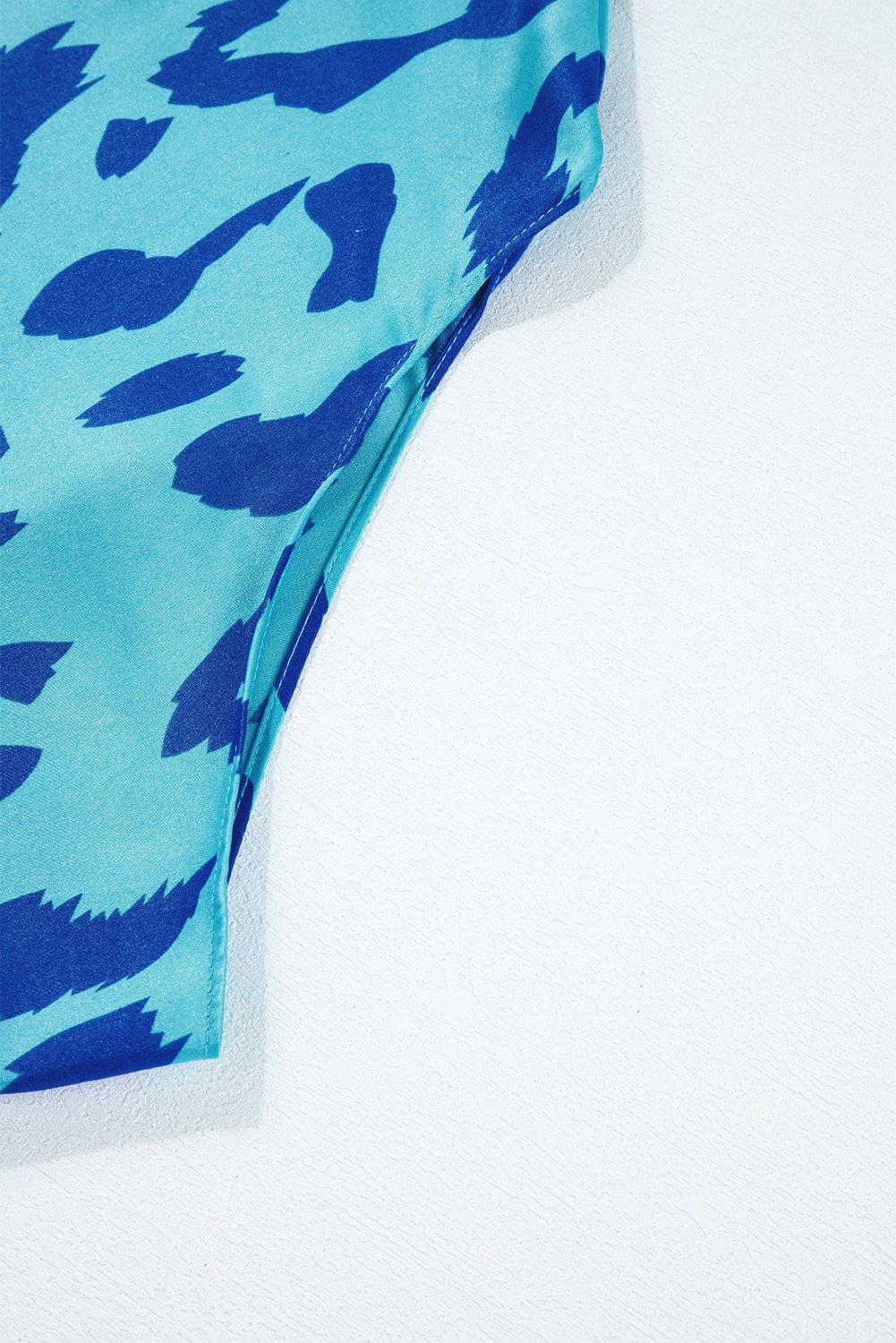 Blue Leopard Mock Neck Satin Blouse