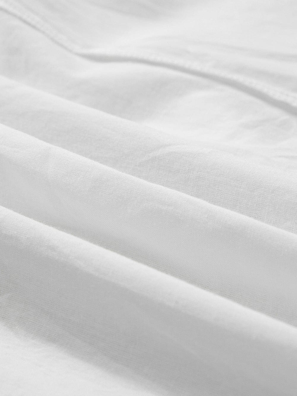 Bohemian White Eyelet Halter Dress with Sleeveless Design