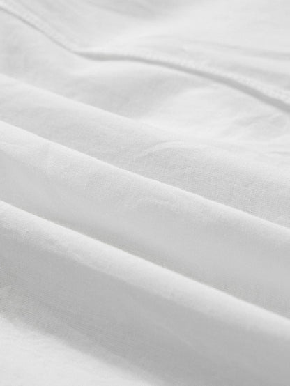 Bohemian White Eyelet Halter Dress with Sleeveless Design