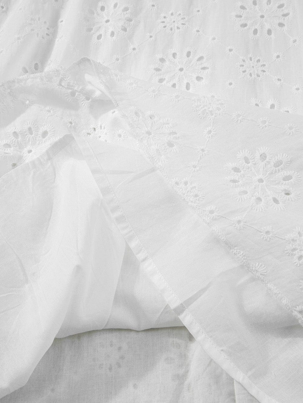 Bohemian White Eyelet Halter Dress with Sleeveless Design