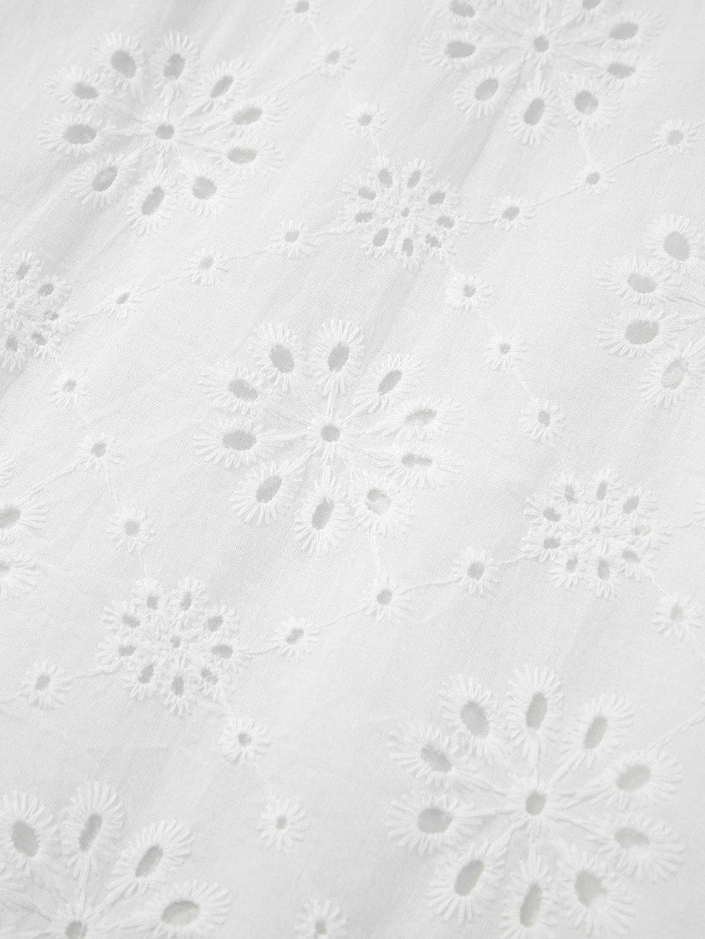 Bohemian White Eyelet Halter Dress with Sleeveless Design