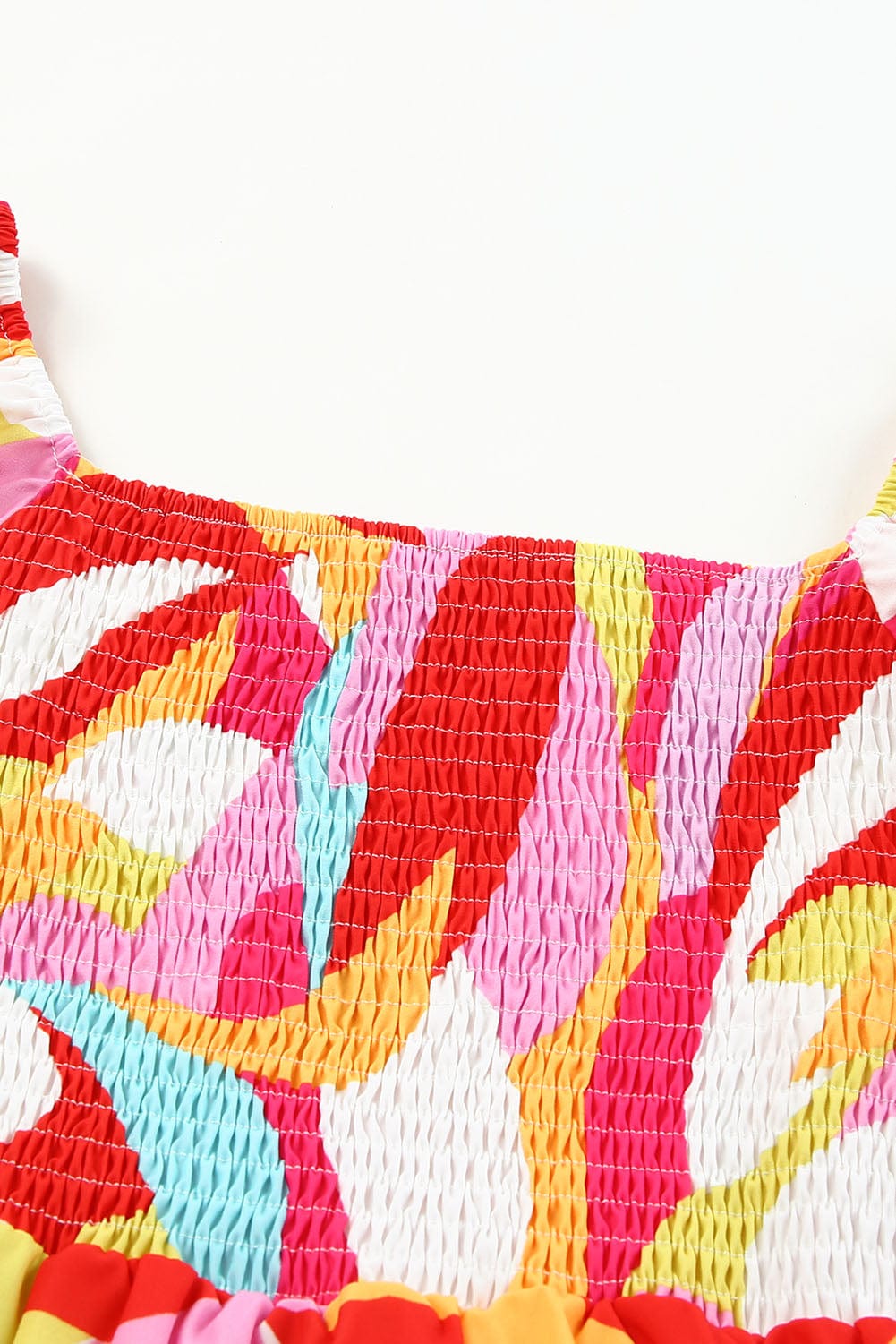 Boho Chic Smocked Mini Dress with Geometric Print and Puff Sleeves