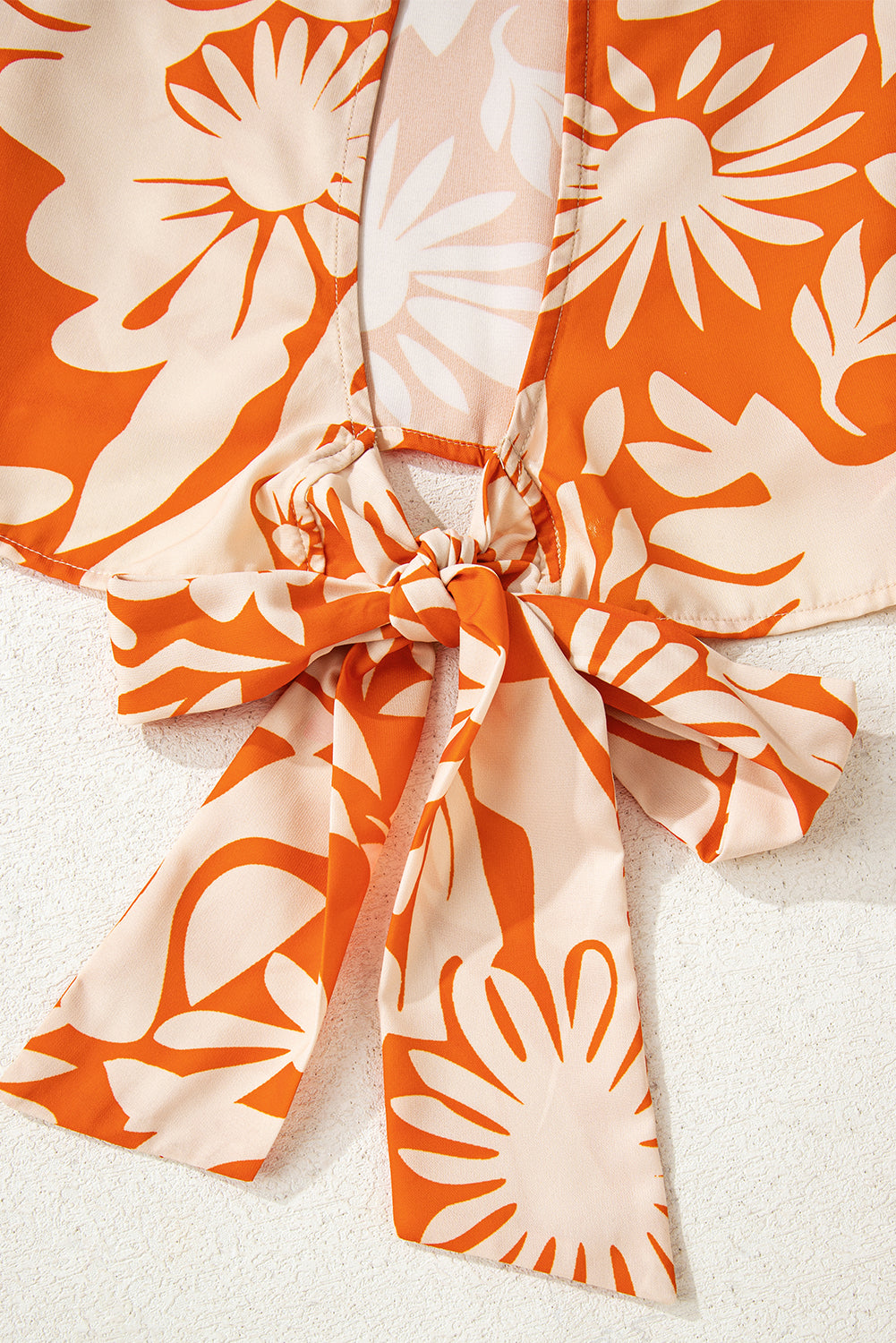 orange floral blouse