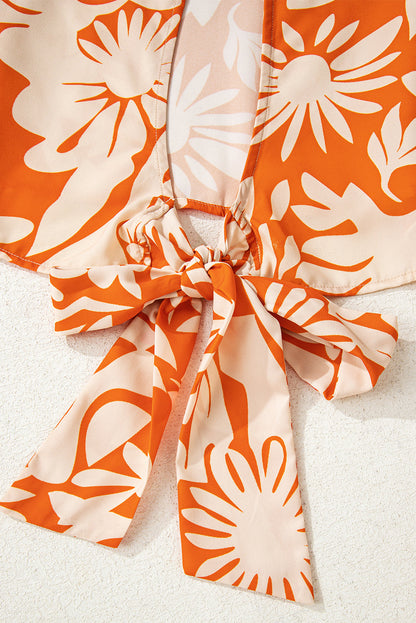 orange floral blouse