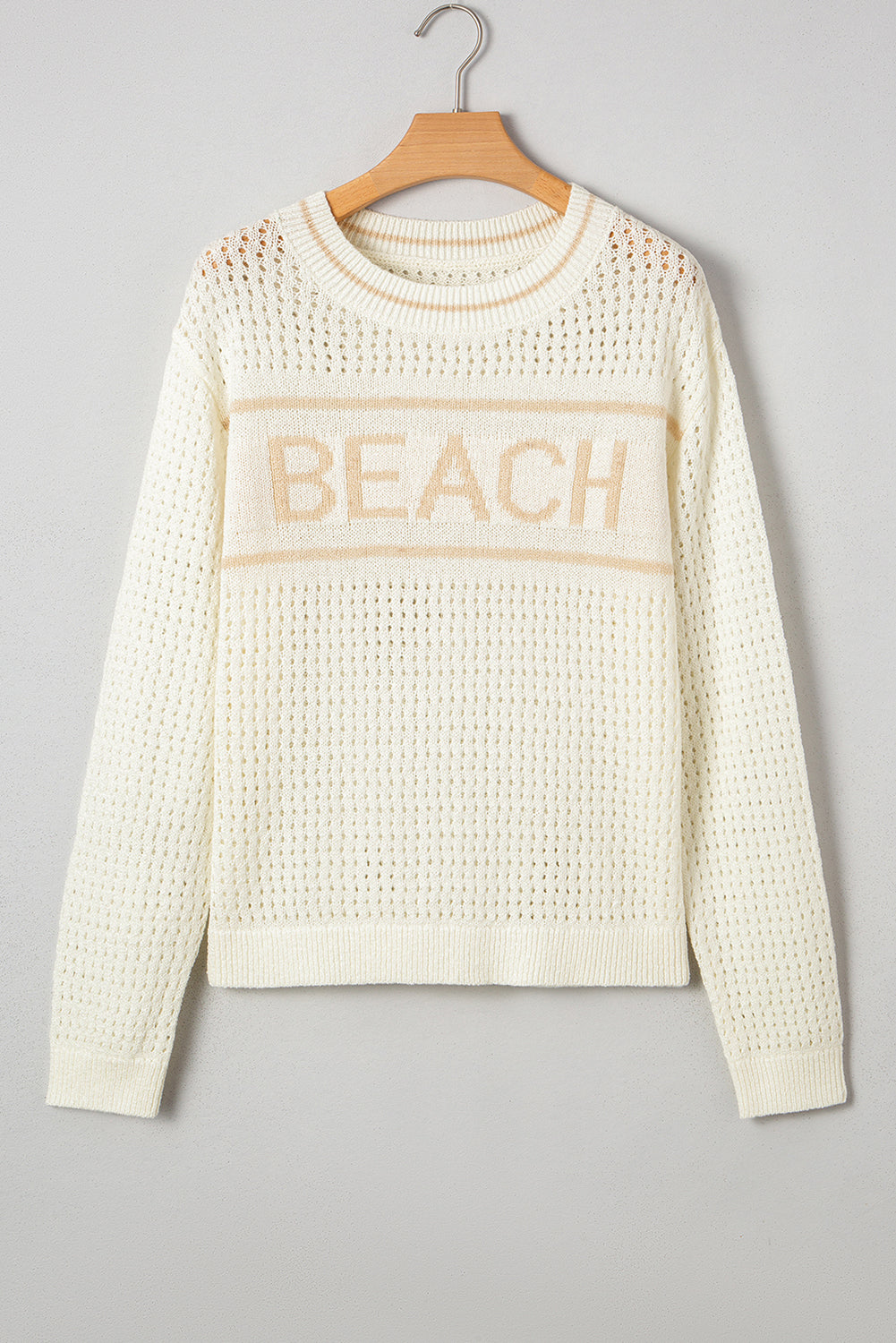 white beach sweater