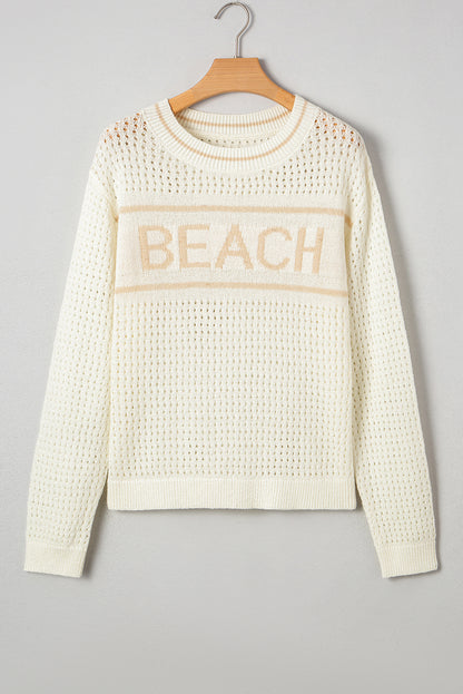 white beach sweater