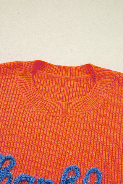 orange graphic sweater