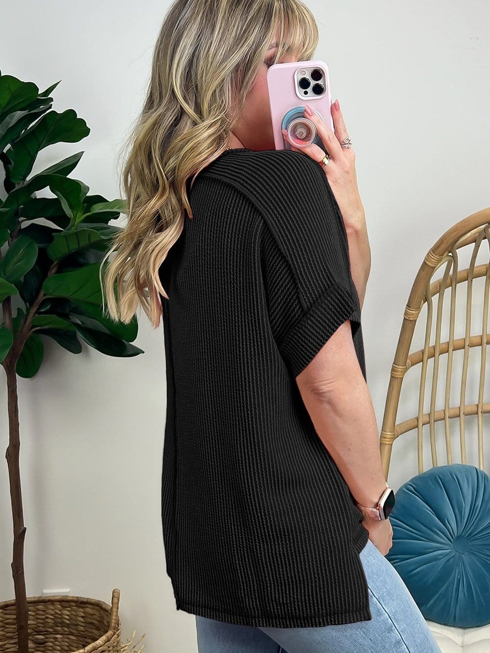 Chic Black Ribbed Tee with Exposed Stitching