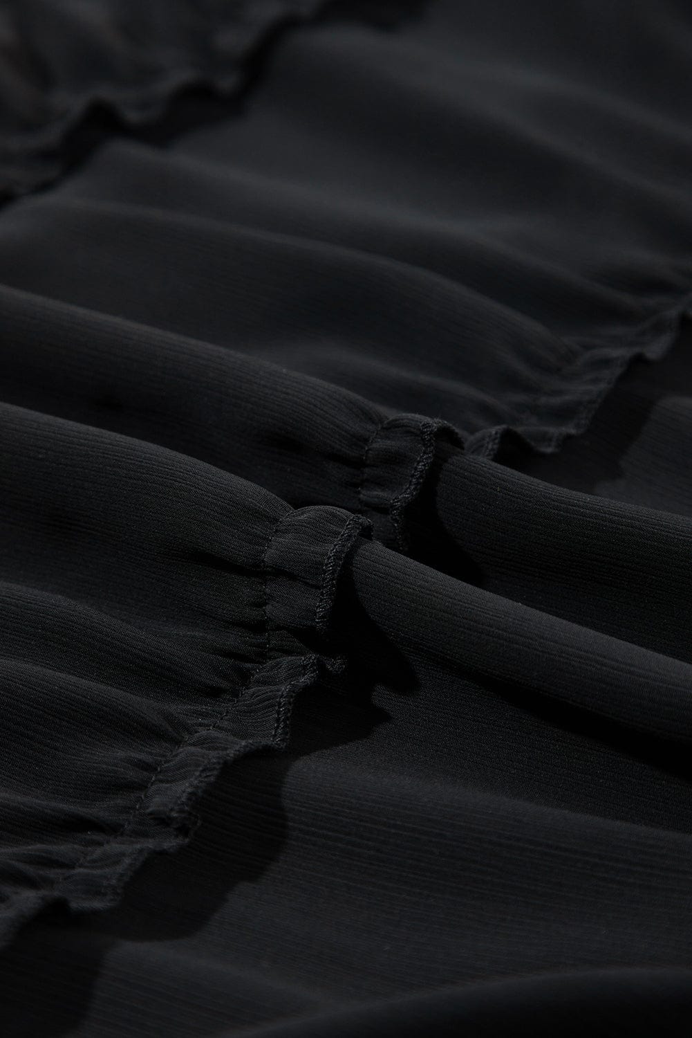 Chic Black Tiered Sleeveless Summer Dress with Button Detail