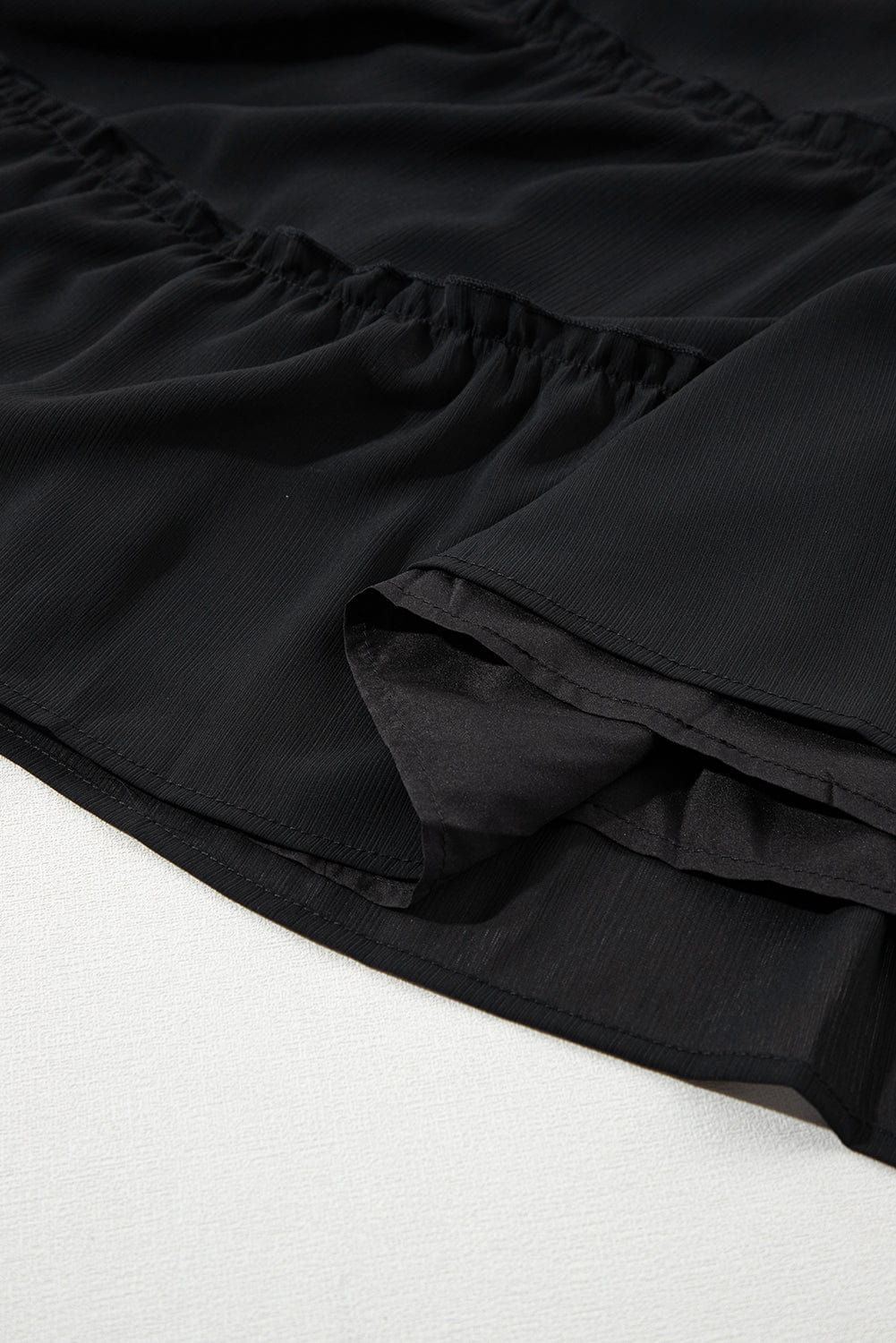 Chic Black Tiered Sleeveless Summer Dress with Button Detail