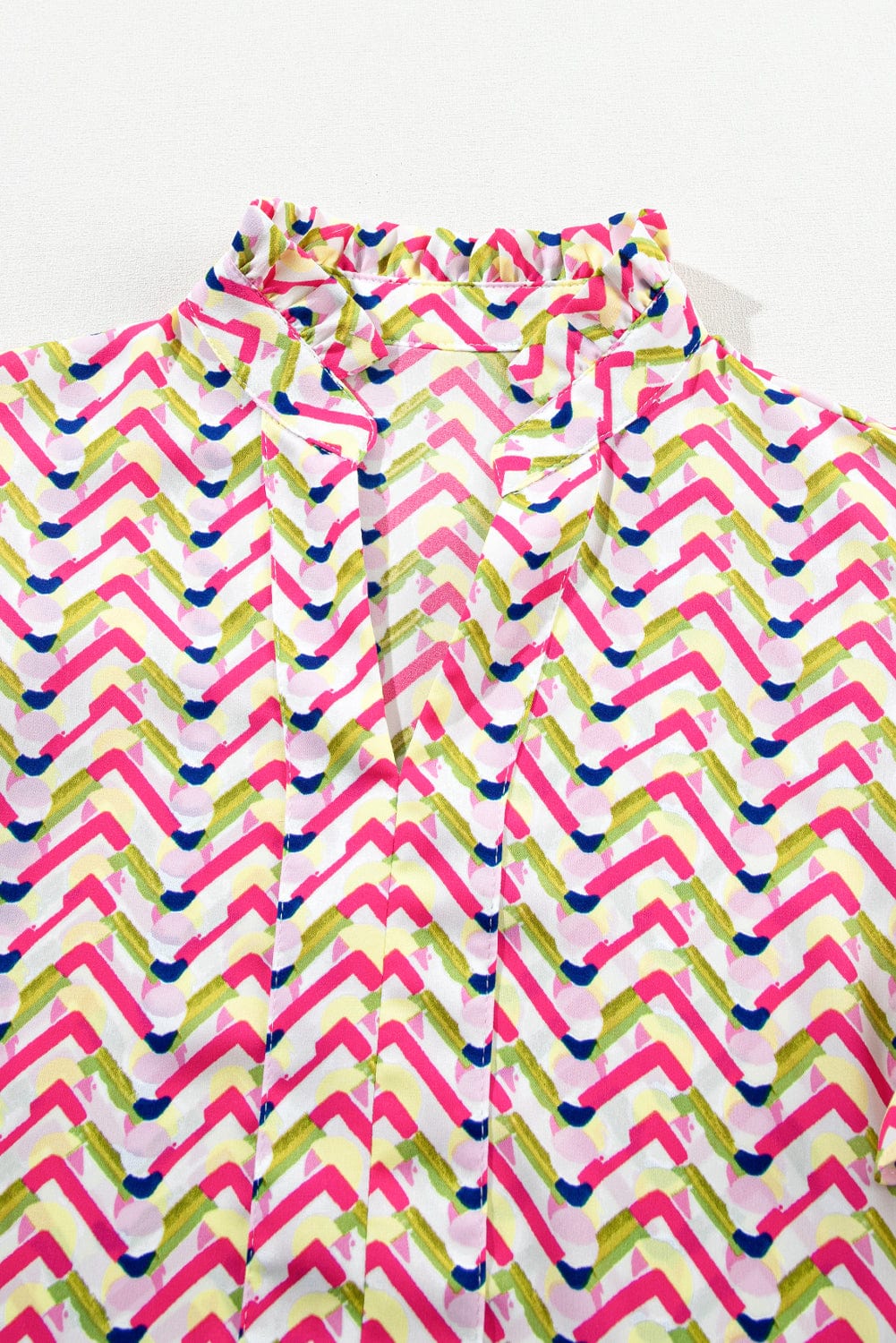 Chic Chevron Patterned Top with Ruffle Sleeves