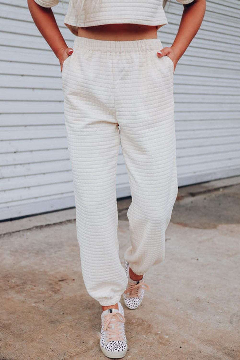 Chic White Textured Lattice Crop Top and Jogger Pants Ensemble