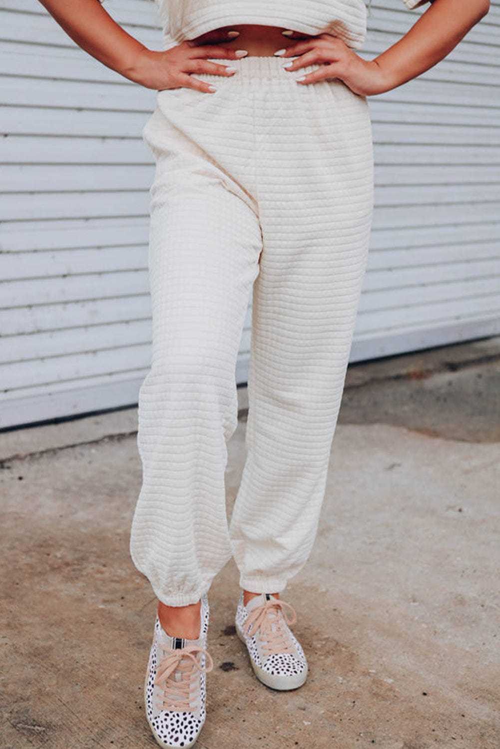 Chic White Textured Lattice Crop Top and Jogger Pants Ensemble