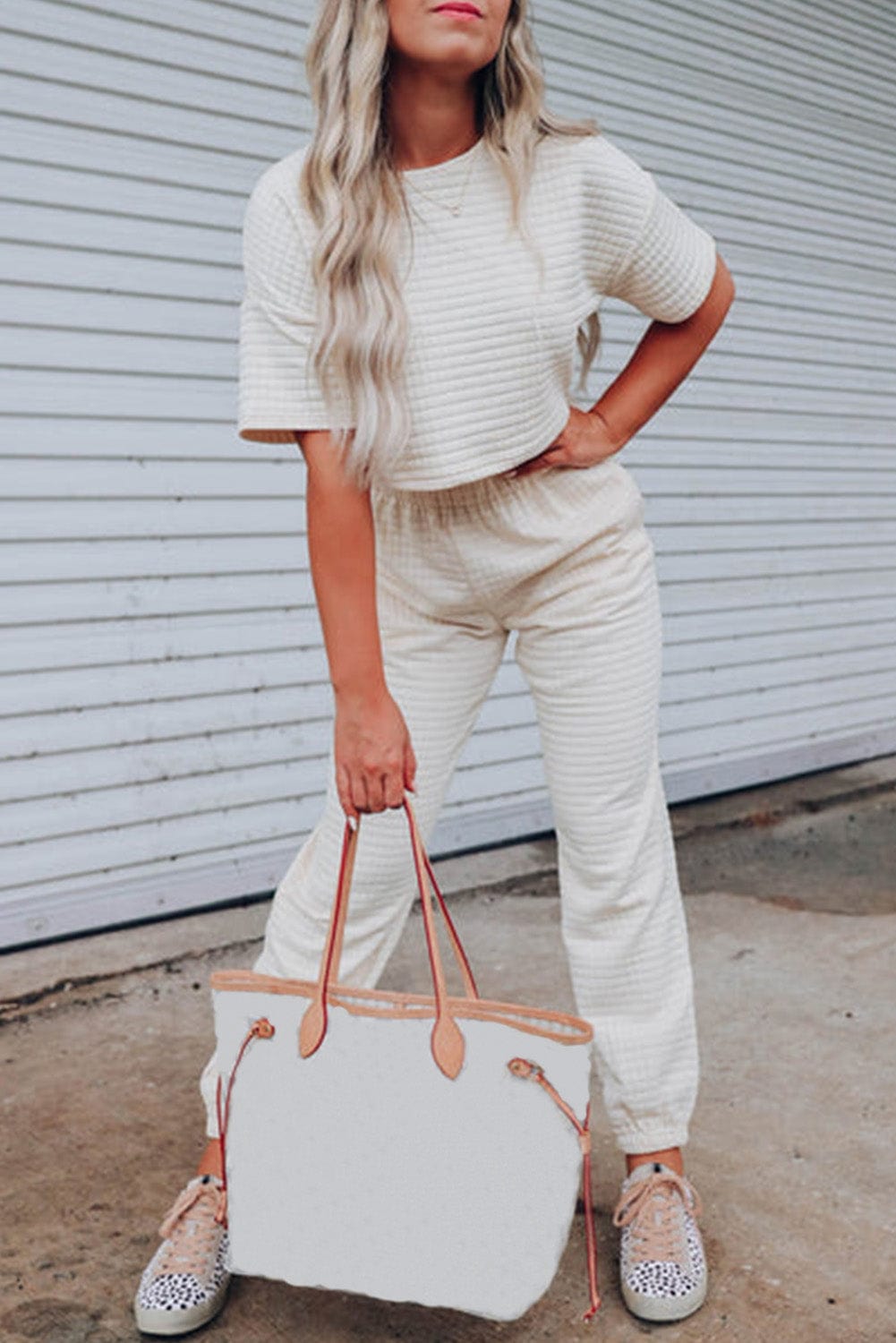 Chic White Textured Lattice Crop Top and Jogger Pants Ensemble