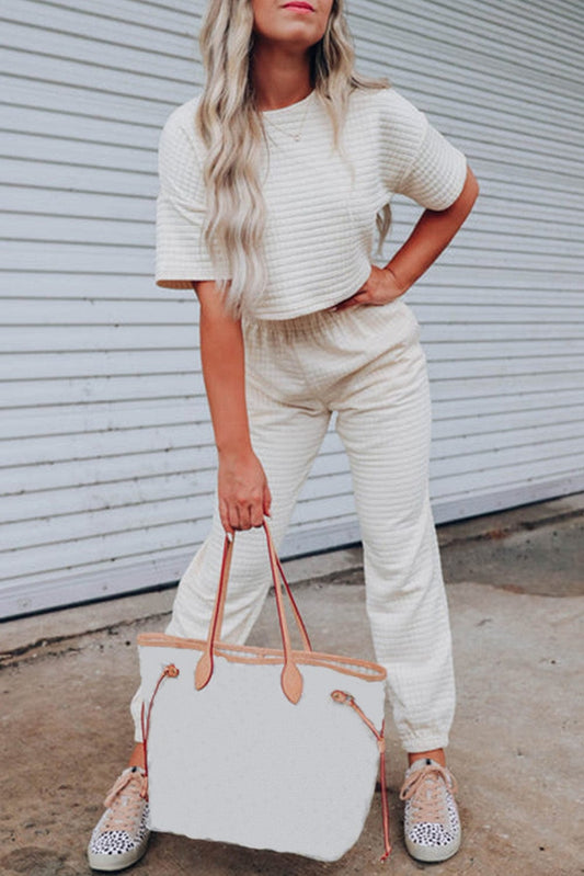Chic White Textured Lattice Crop Top and Jogger Pants Ensemble