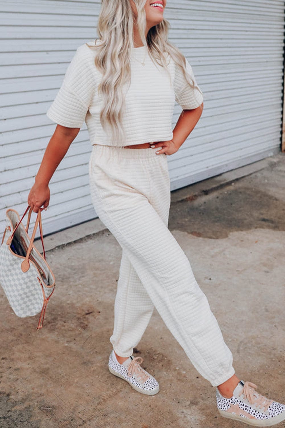 Chic White Textured Lattice Crop Top and Jogger Pants Ensemble