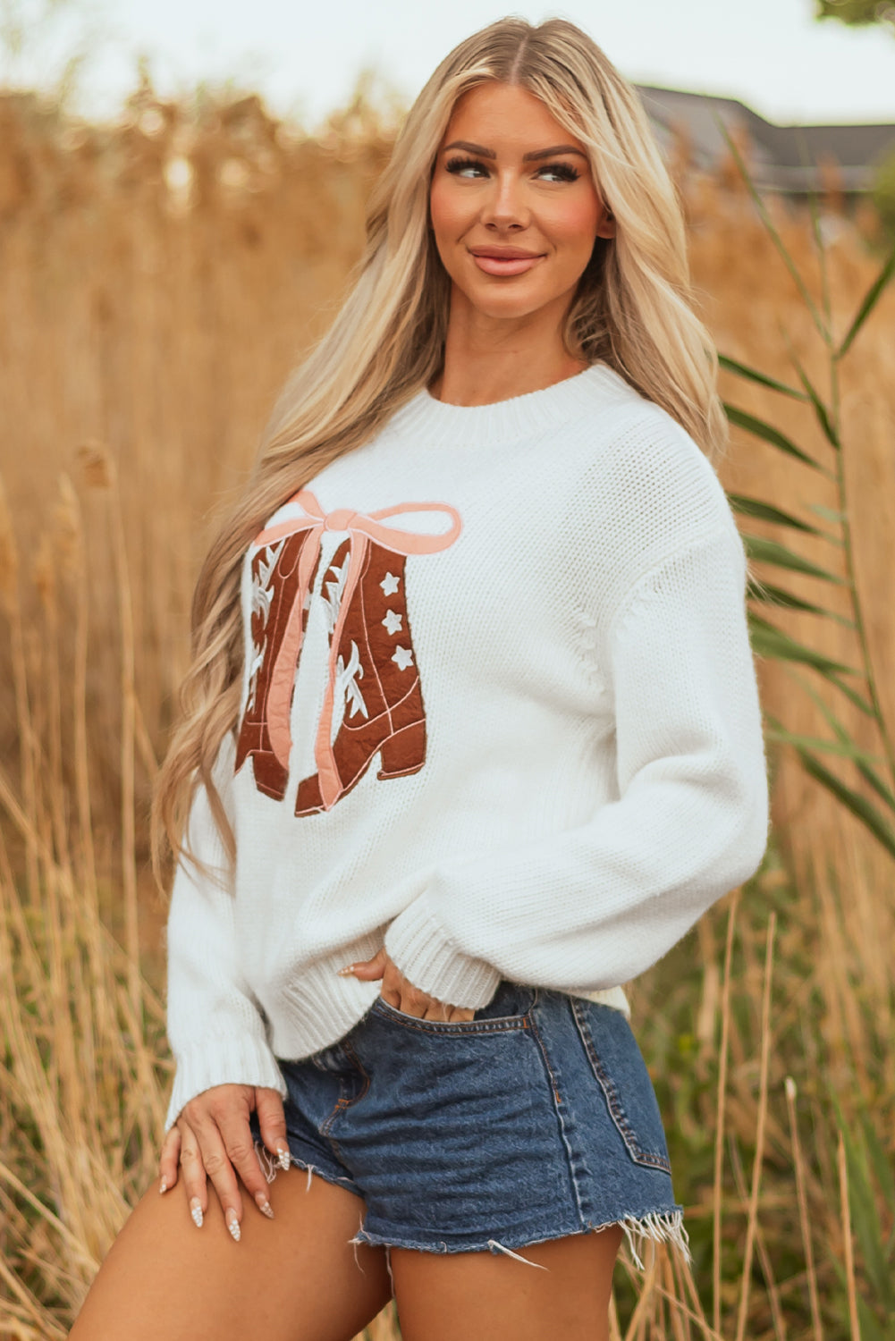 white embroidered sweater