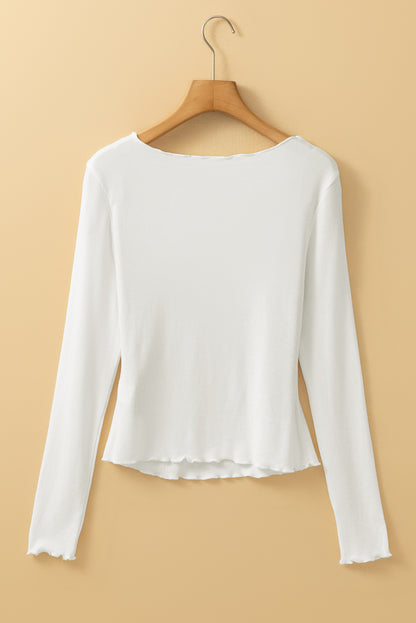 white long sleeve top