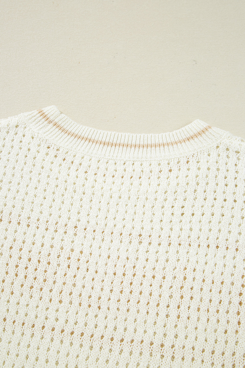 white beach sweater