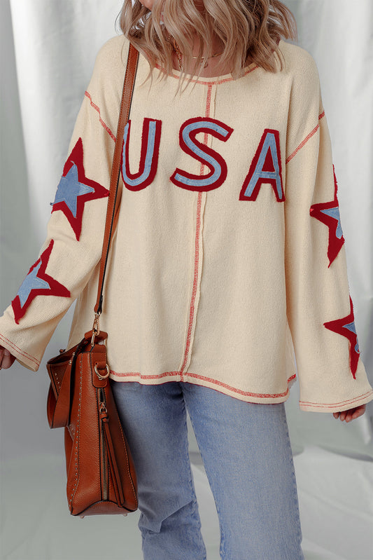 exposed seam long sleeve top