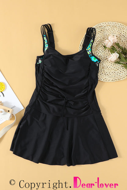 Floral Print Black Swimdress with Adjustable Straps and Ruched Panel