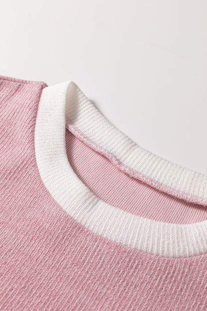 light pink knit top