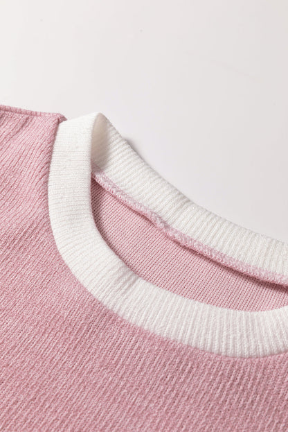light pink knit top
