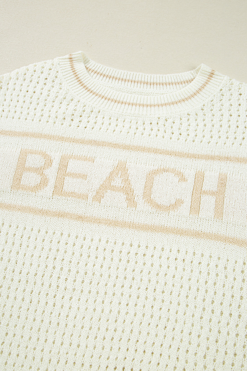 white beach sweater